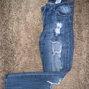 Distressed blue jeans. Size 11